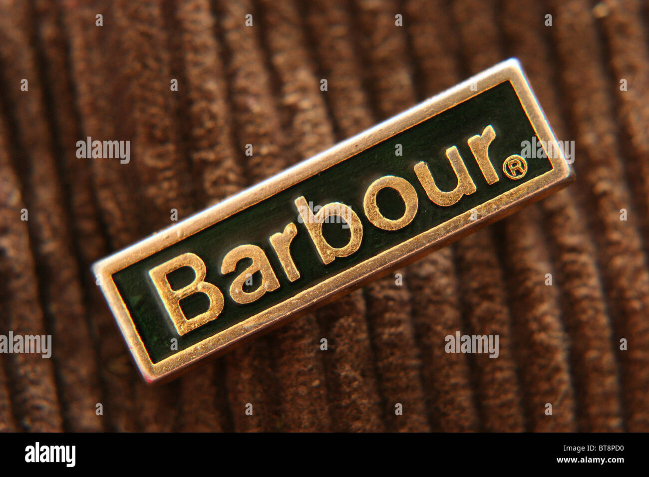 A Barbour badge pined to a Traditional Barbour Wax jacket Stock Photo -  Alamy