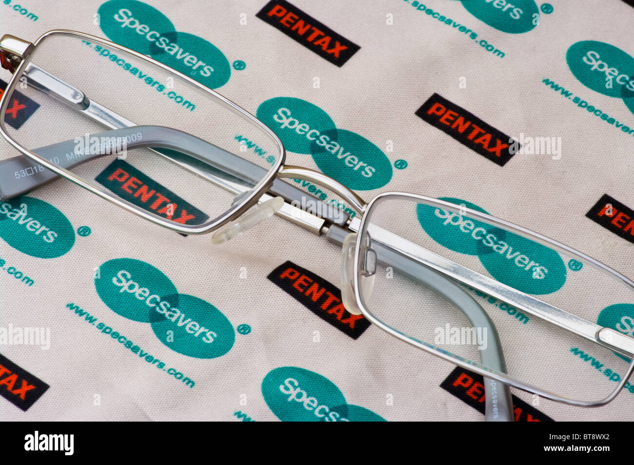 Pair Of Spectacles On A Specsavers Lens Cloth Stock Photo