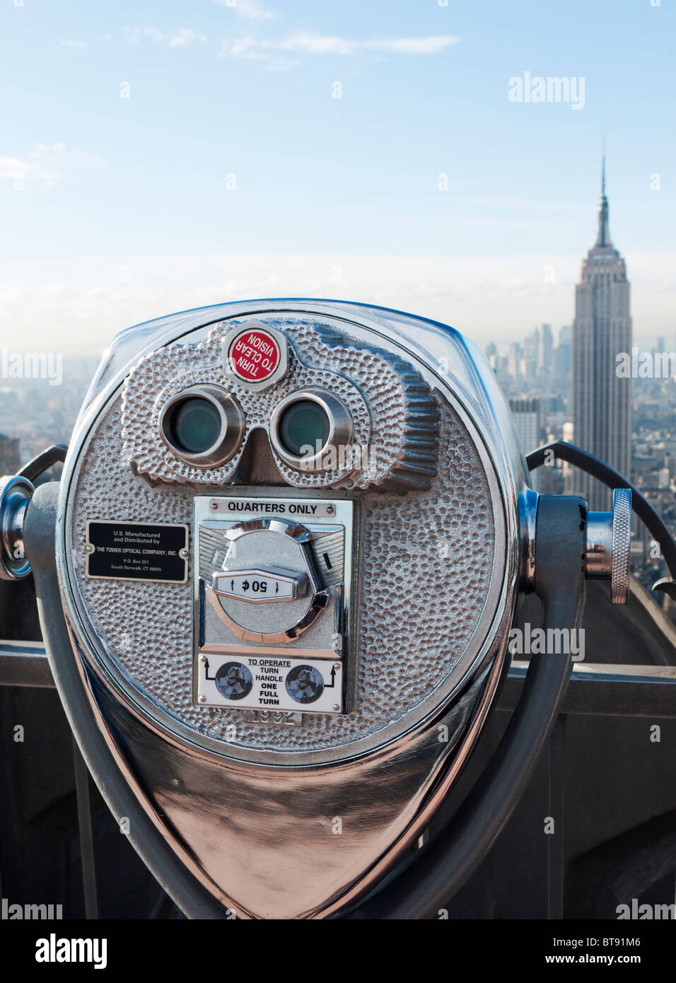 Public pay viewing coin operated binoculars on Top of The Rock observation platform at Rockefeller Center in Manhattan New York Stock Photo