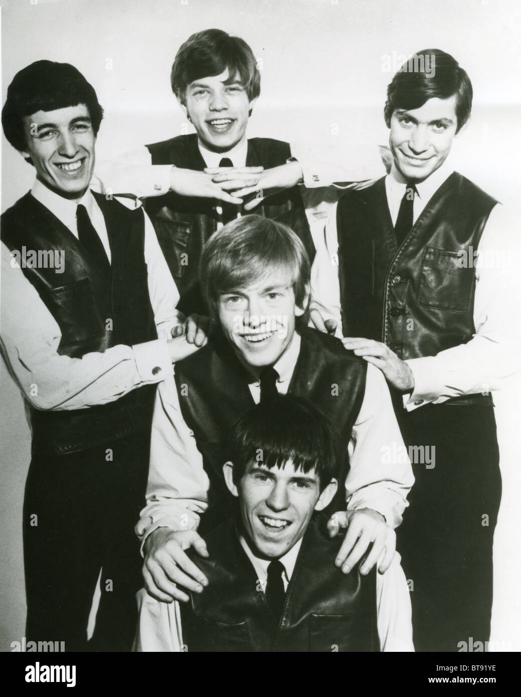 ROLLING STONES Promotional photo late 1962 from l: Bill, Mick, Charlie and lower brian with hands on Keith Stock Photo