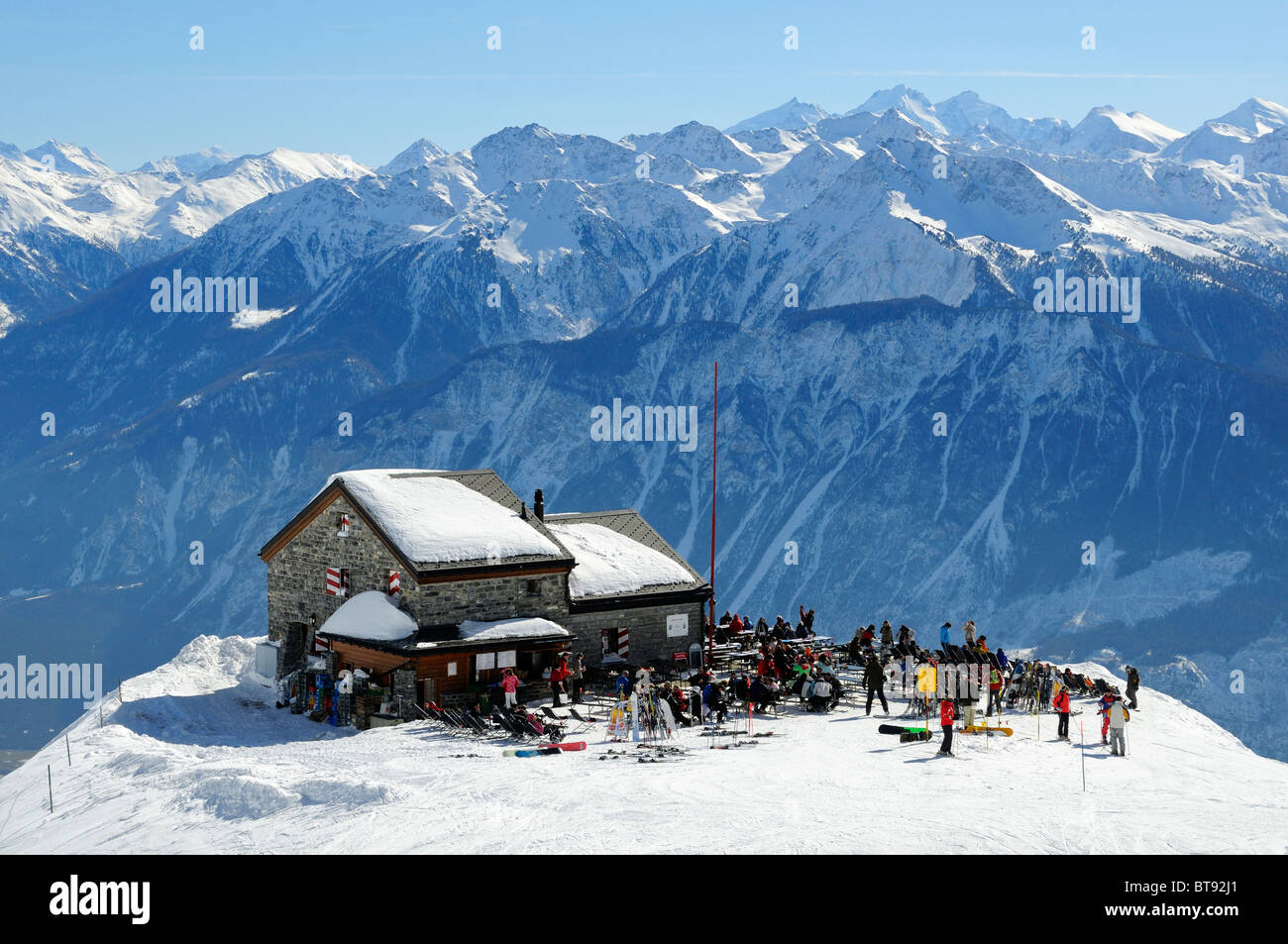 Skiers at the refuge Les Violettes of the Swiss Alpin Club in the Pennine Alps, Crans Montana, Valais, Switzerland Stock Photo