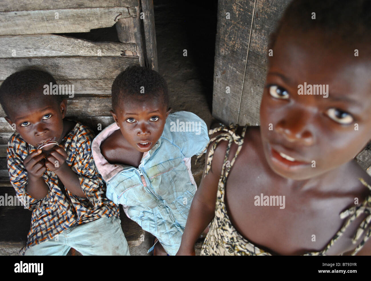 Scared Liberian refugee children in Tabou Transit Camp, West Africa Stock Photo