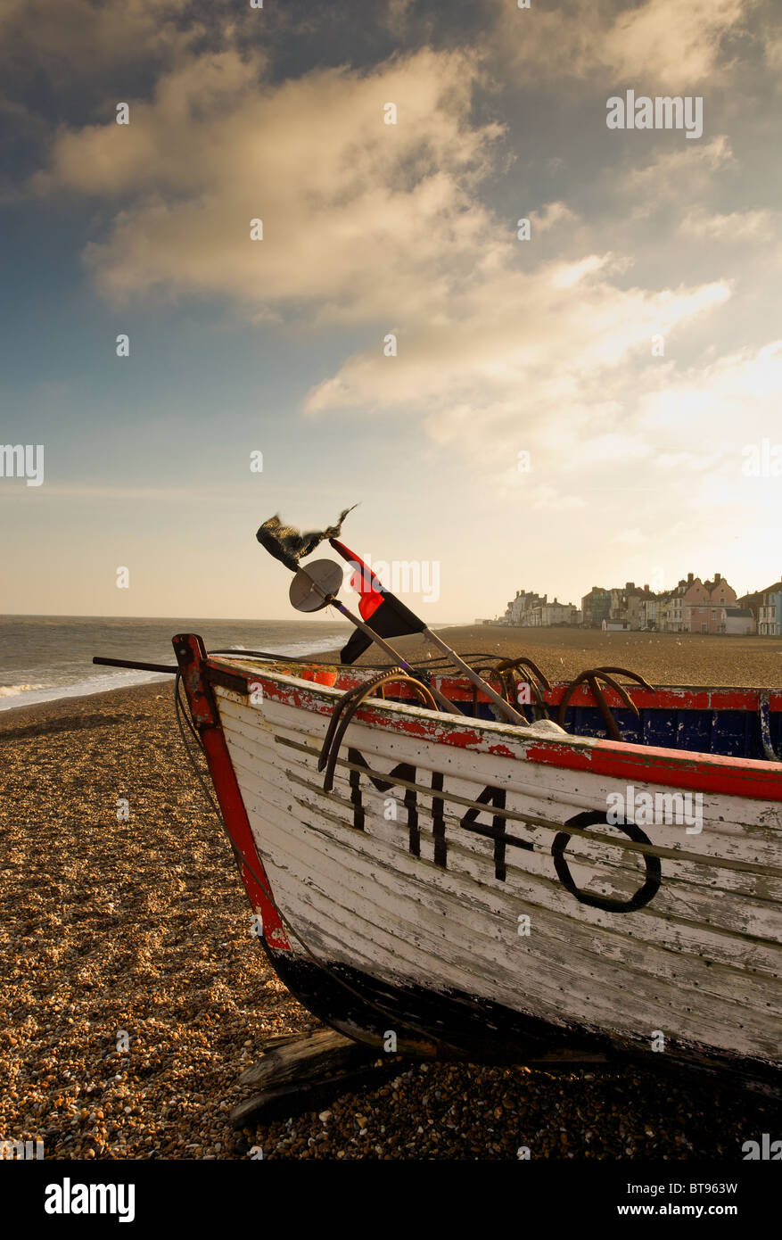 Aldeburgh town from the beach with a fishing boat in the foreground Stock Photo