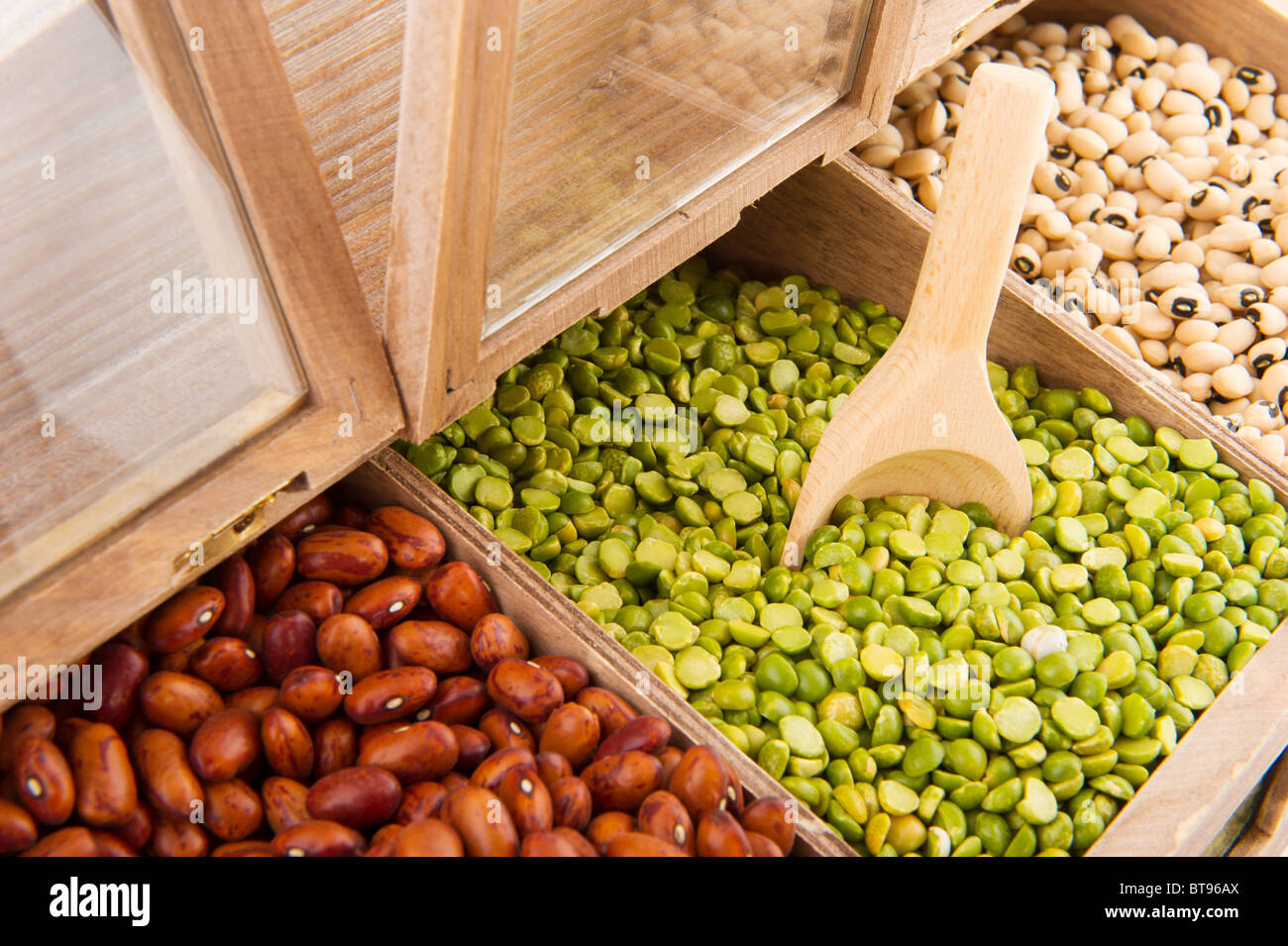 Various dried legumes in wooden shop shelfs Stock Photo Alamy