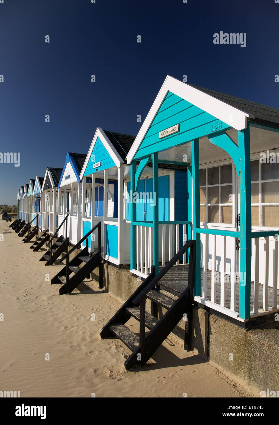 Colourful line of beach huts at Southwold, Suffolk Stock Photo