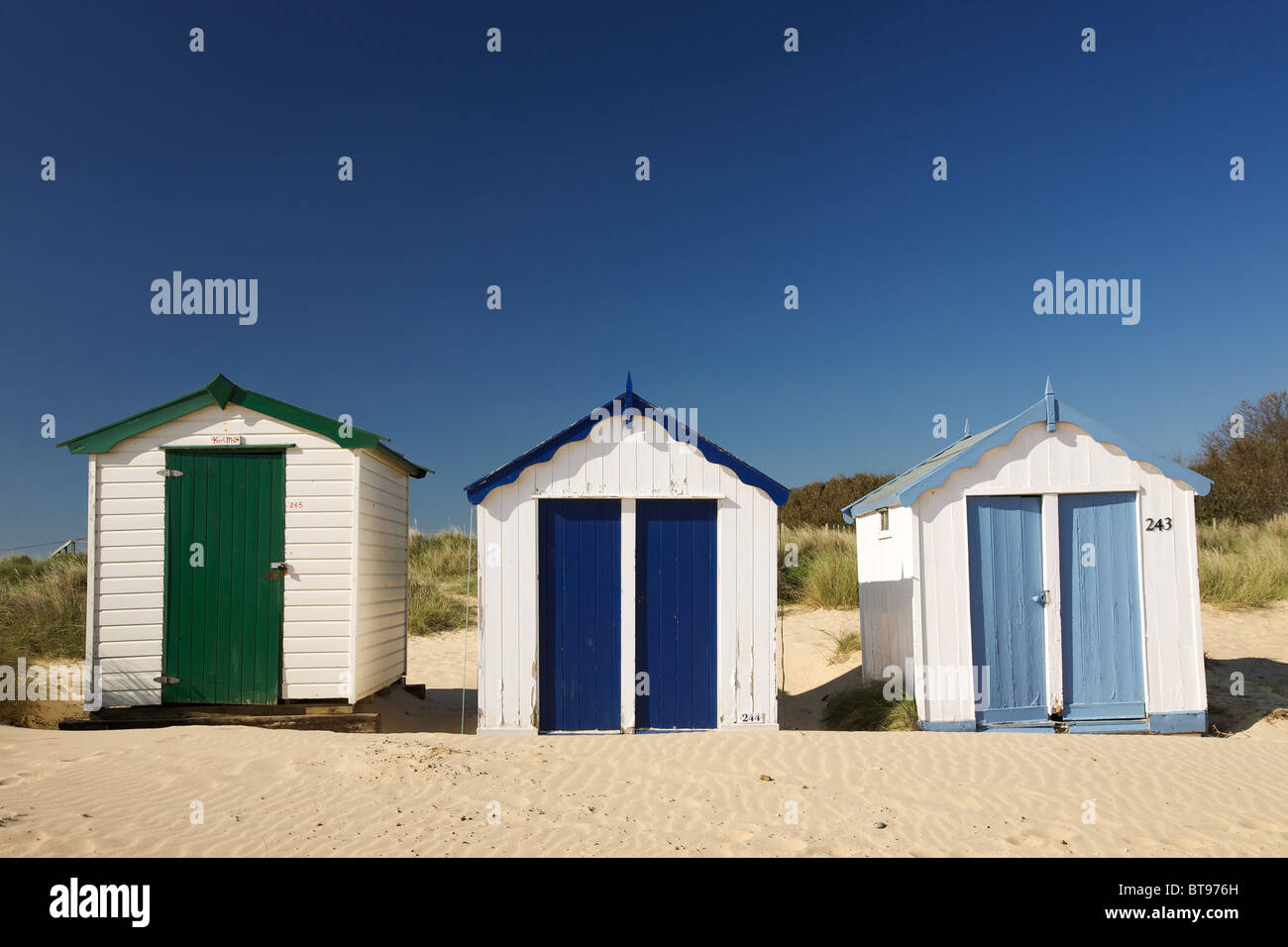 Three beach huts at Southwold, Suffolk Stock Photo