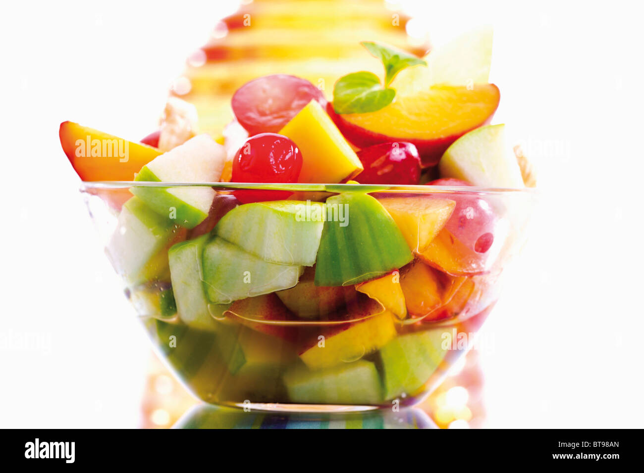 Fruit salad in a glass bowl Stock Photo - Alamy