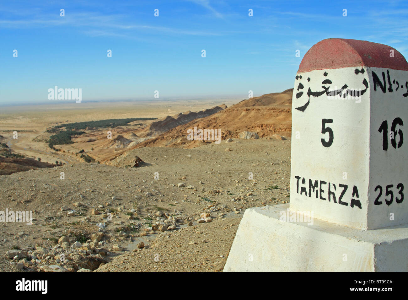 Mile post, near Tamerza and Tozeur, Sahara Desert, western Tunisia Stock Photo