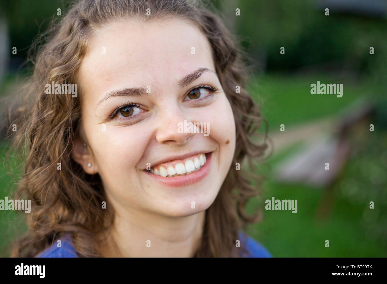 Curly brown hair brown eye hi-res stock photography and images - Alamy
