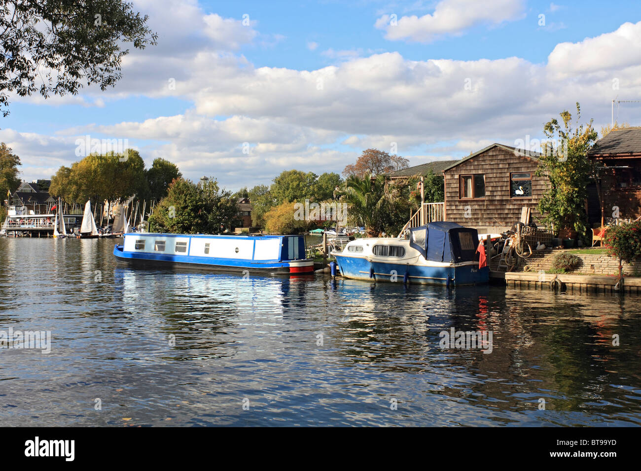 Hampton Sailing Club and houseboats on the River Thames at Hampton, England UK. Stock Photo