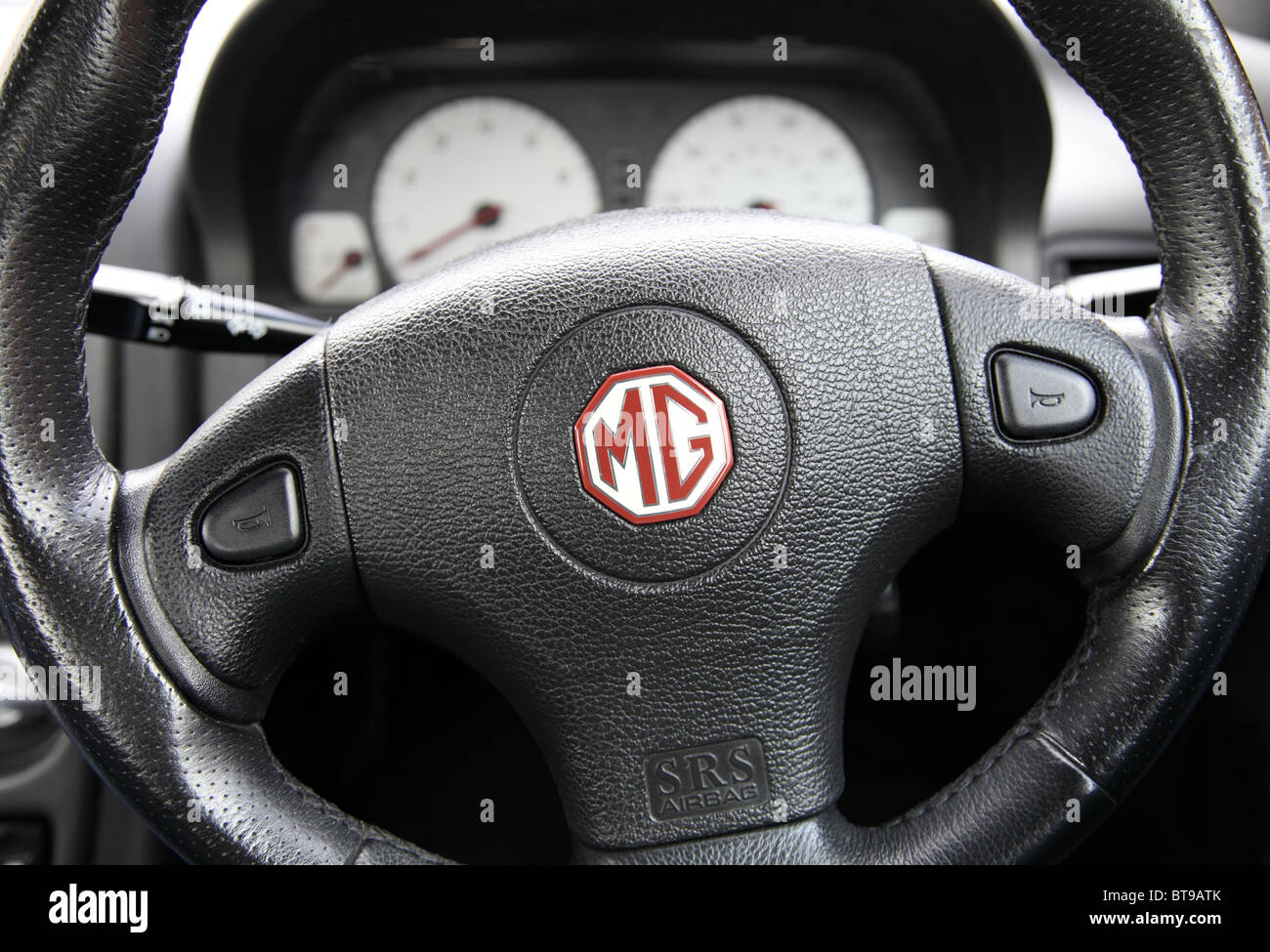 Steering wheel sports car hires stock photography and images Alamy