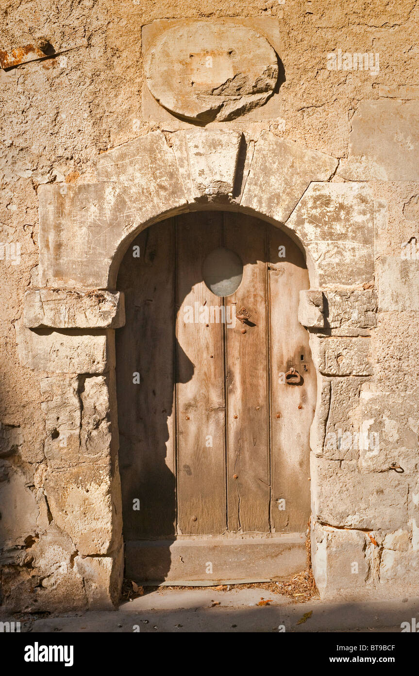 Old Oak door and stone doorway - sud-Touraine, France. Stock Photo