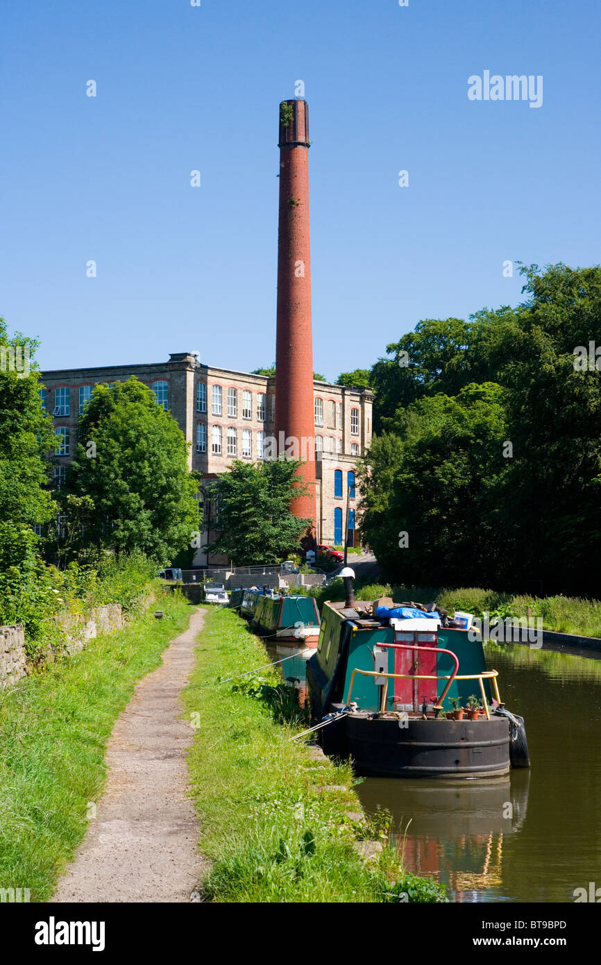 Narrow Boats at Clarence Mill on the Macclesfield Canal at Bollington in Cheshire;England; Stock Photo