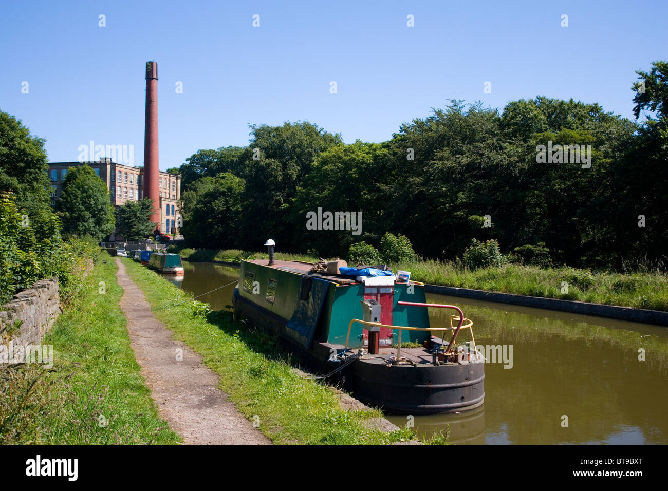 Narrow Boats at Clarence Mill on the Macclesfield Canal;Bollington;Cheshire;England; Stock Photo
