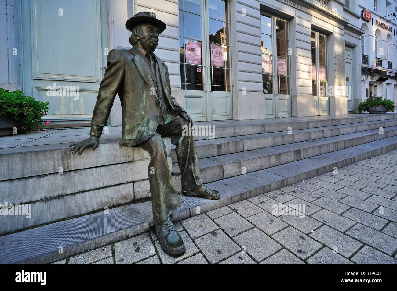 Statue of actor comedian Romain De Coninck in front of the Minard Theatre at Ghent, Belgium Stock Photo