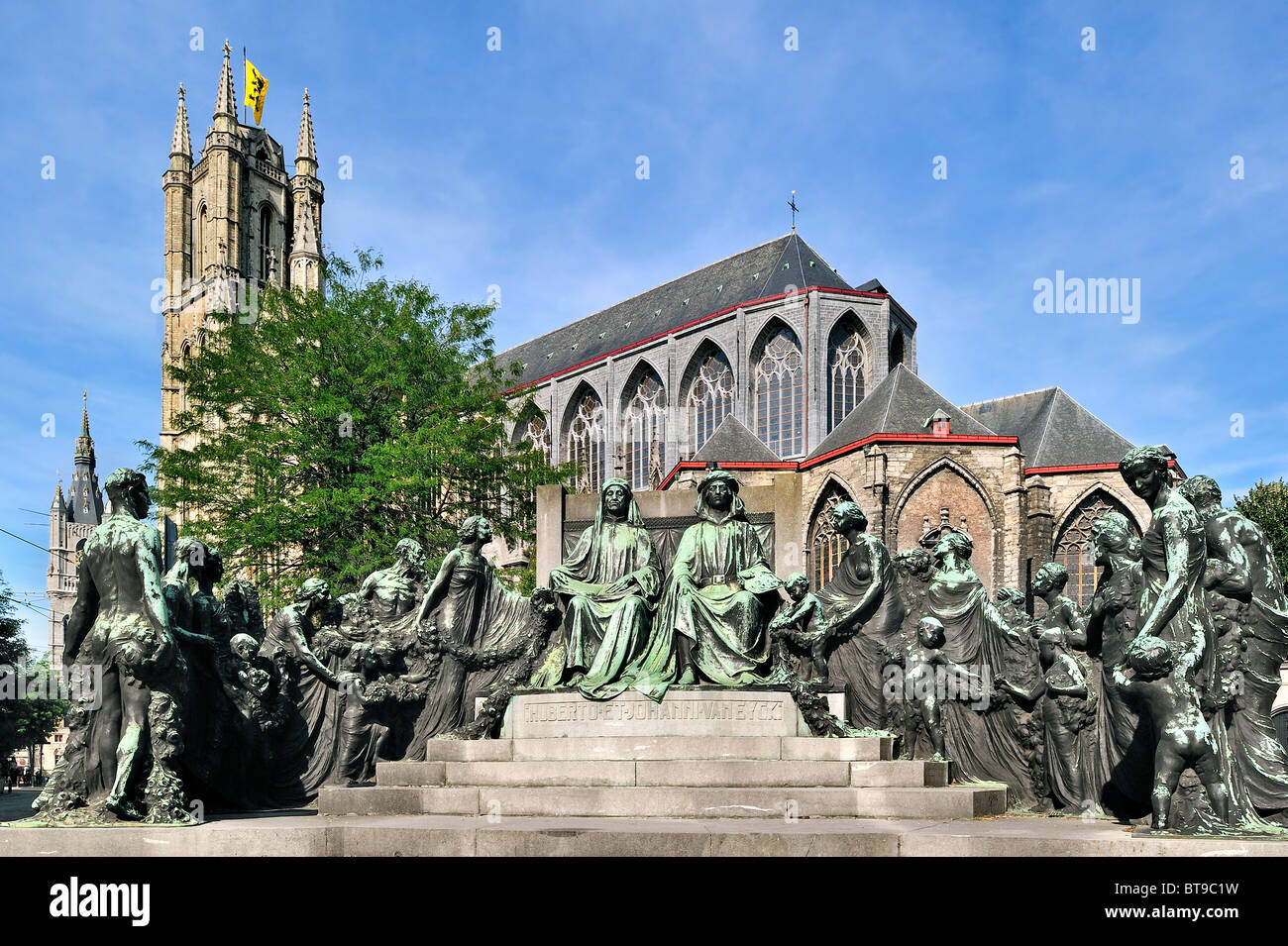 Monument in honour of the Van Eyck brothers and the Saint Bavo cathedral in Ghent, Belgium Stock Photo
