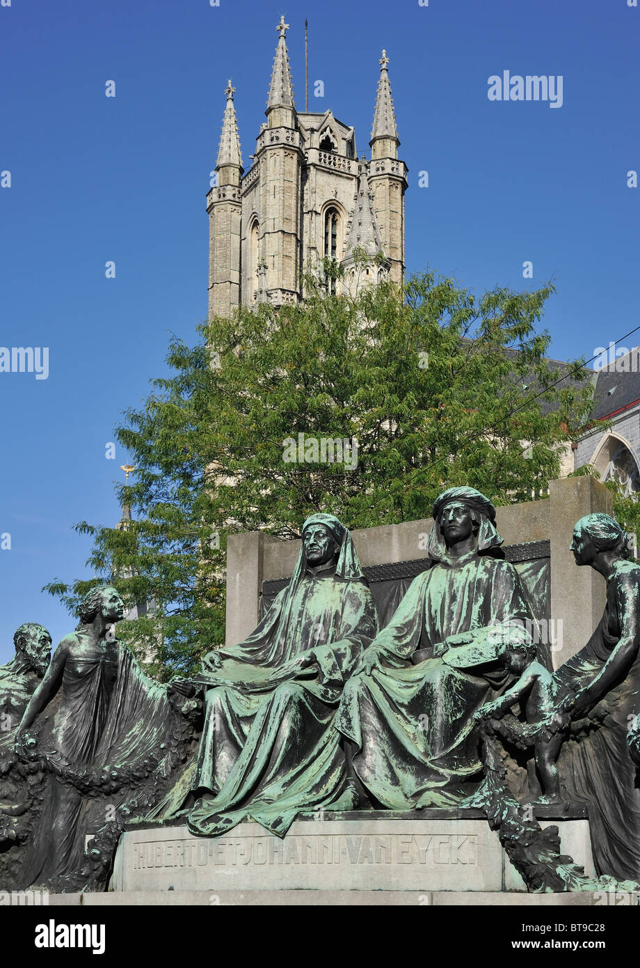 Monument in honour of the Van Eyck brothers and the Saint Bavo cathedral in Ghent, Belgium Stock Photo