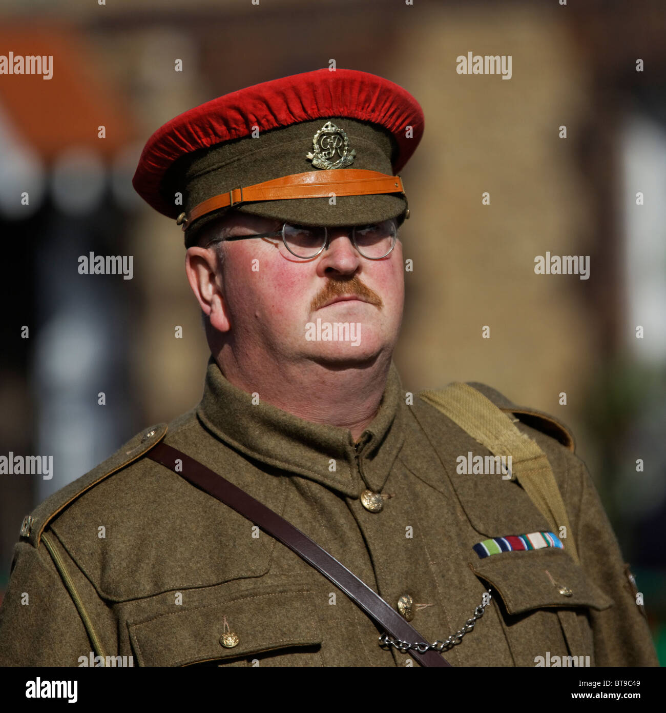 1940s Red Cap British Army Royal Military Police Officer Moustache & Wire Rim Spectacles Stock Photo
