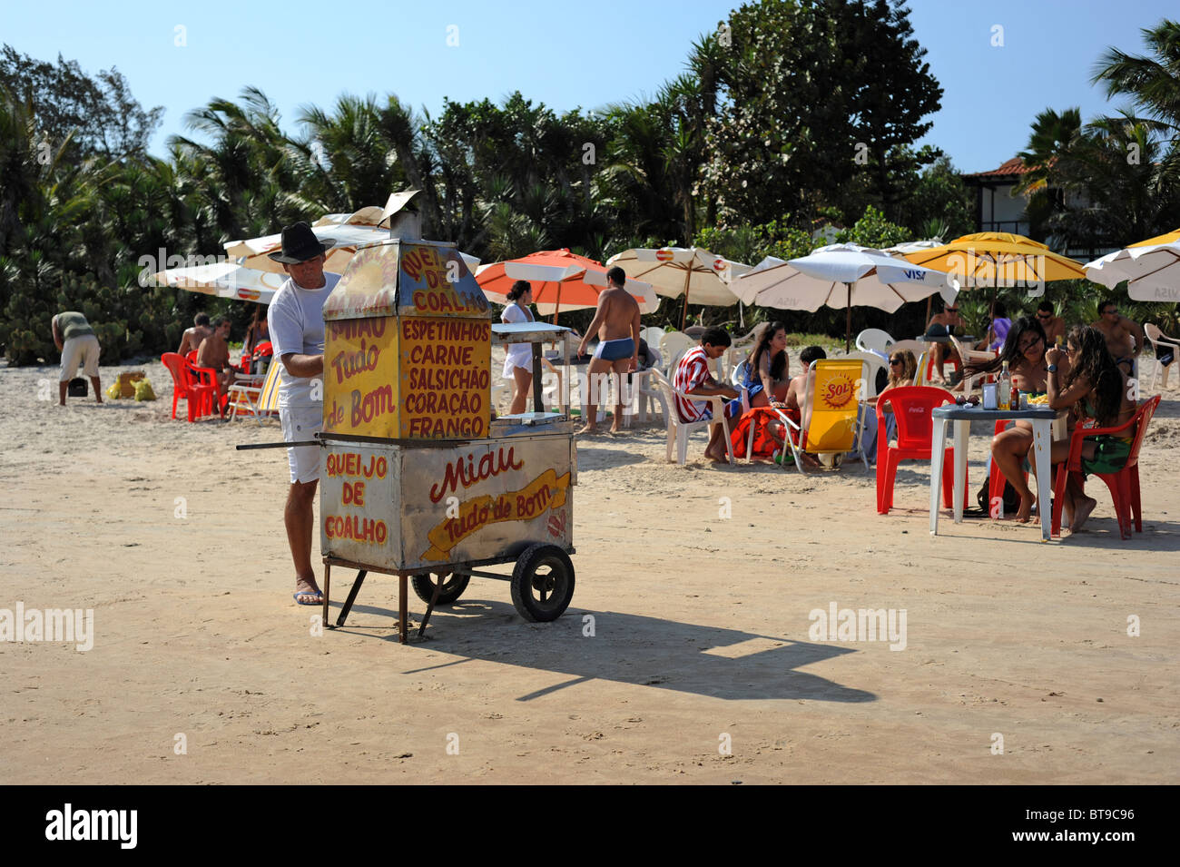 A beach vendor sells food on Geriba Beach Buzios Stock Photo