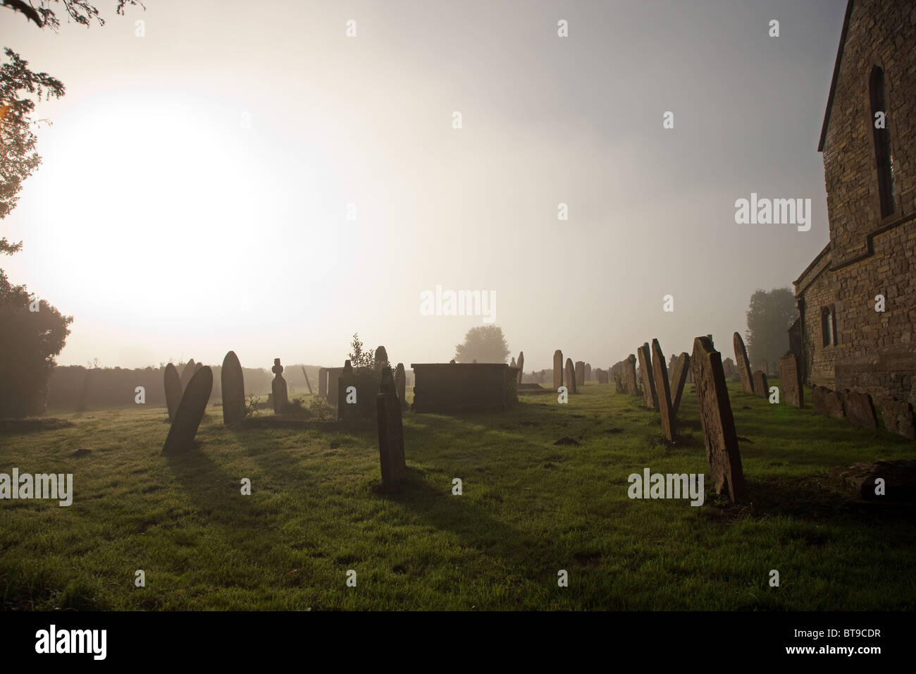 misty graveyard at dawn Stock Photo - Alamy