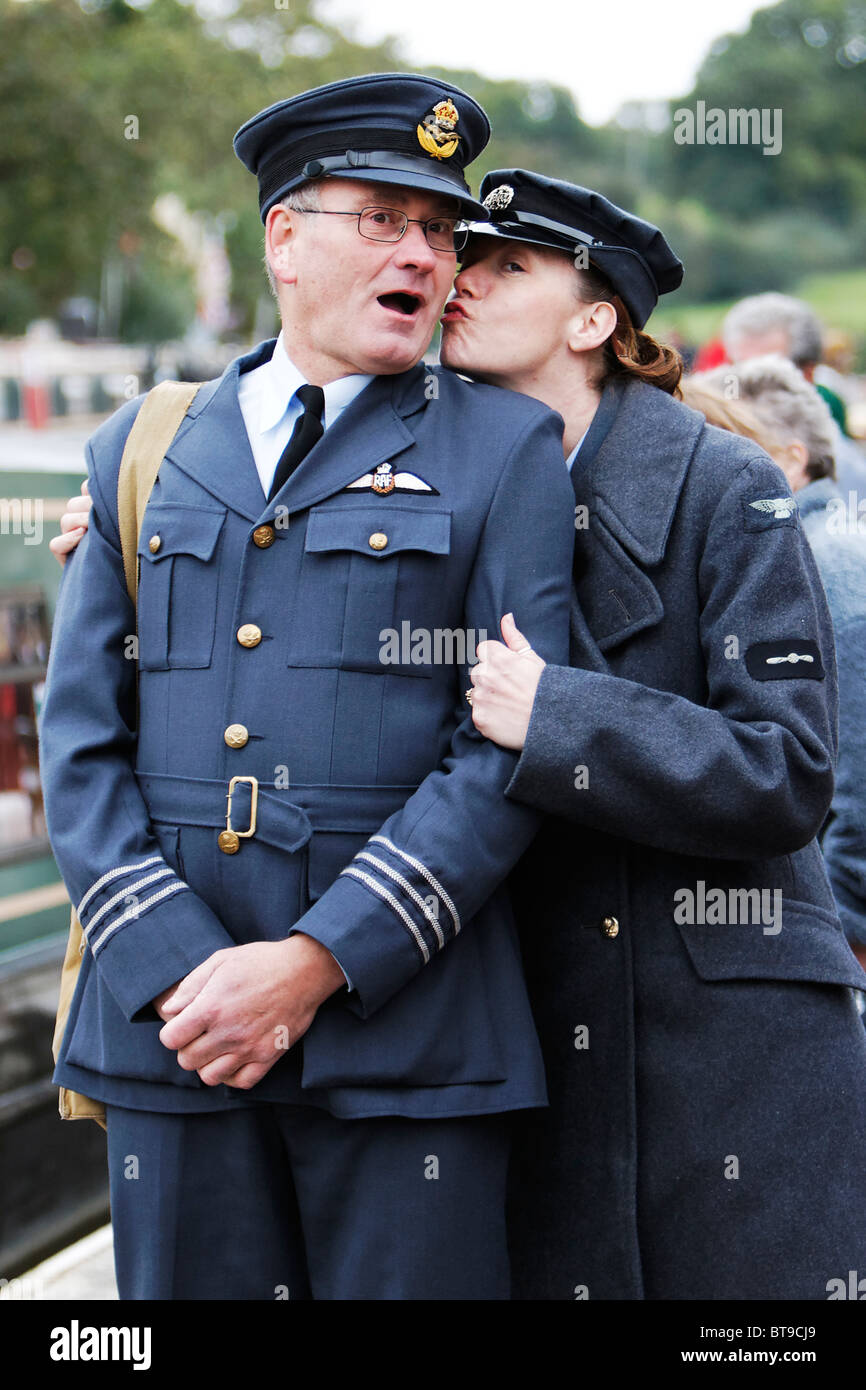 RAF Officer Open Mouthed in Surprise by Kiss from Junior Officer Stock ...