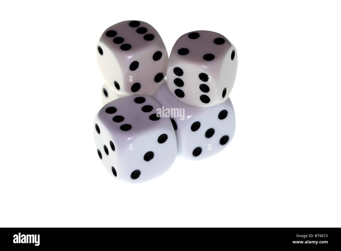 A number of stacked white dice on a white background Stock Photo
