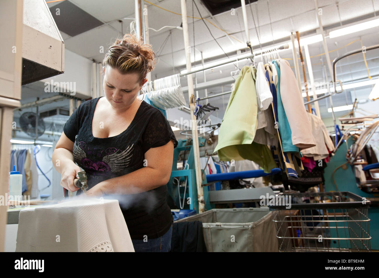 Broomfield, Colorado A worker at Lionheart Cleaners, a laundry and