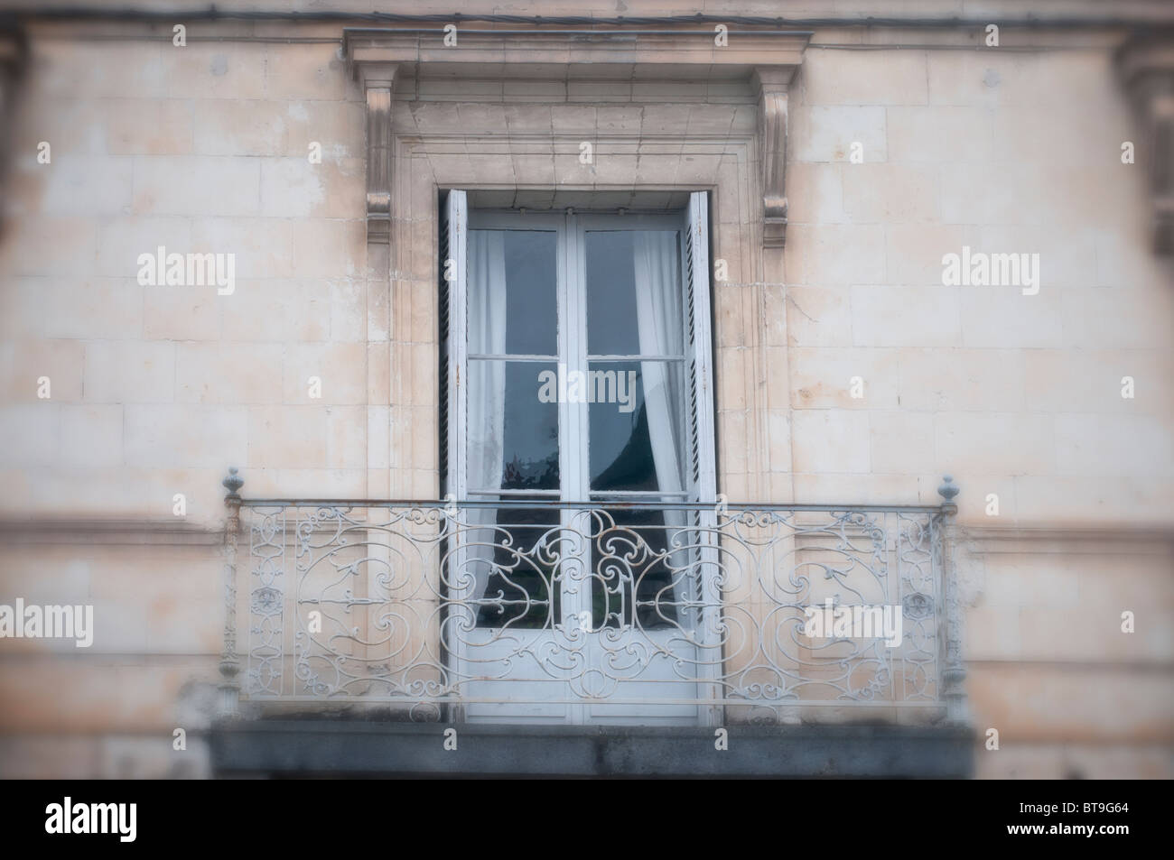 The window and balcony of an old house Stock Photo