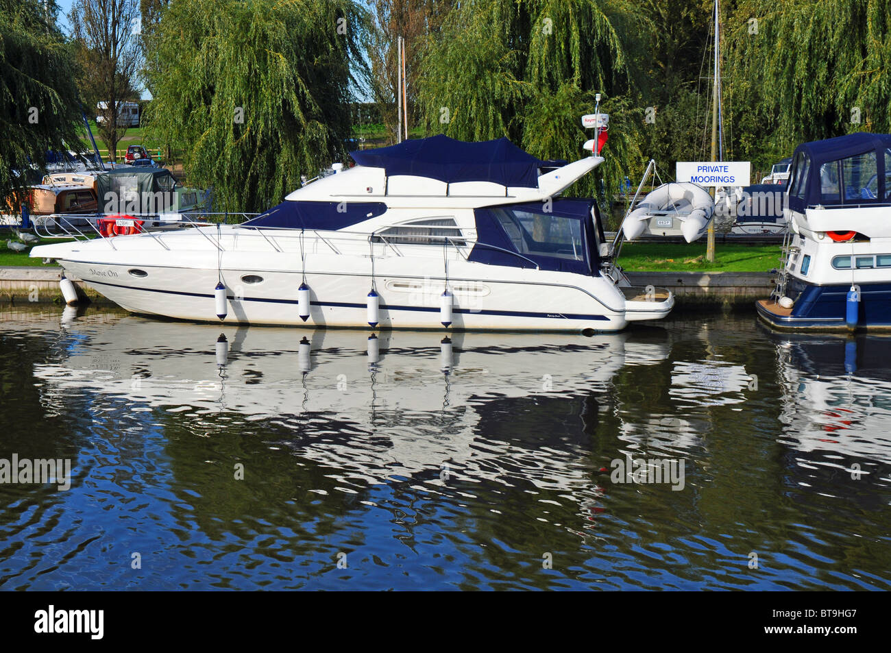 Burgh St Peter, Norfolk, England: cruiser moored in marina Stock Photo