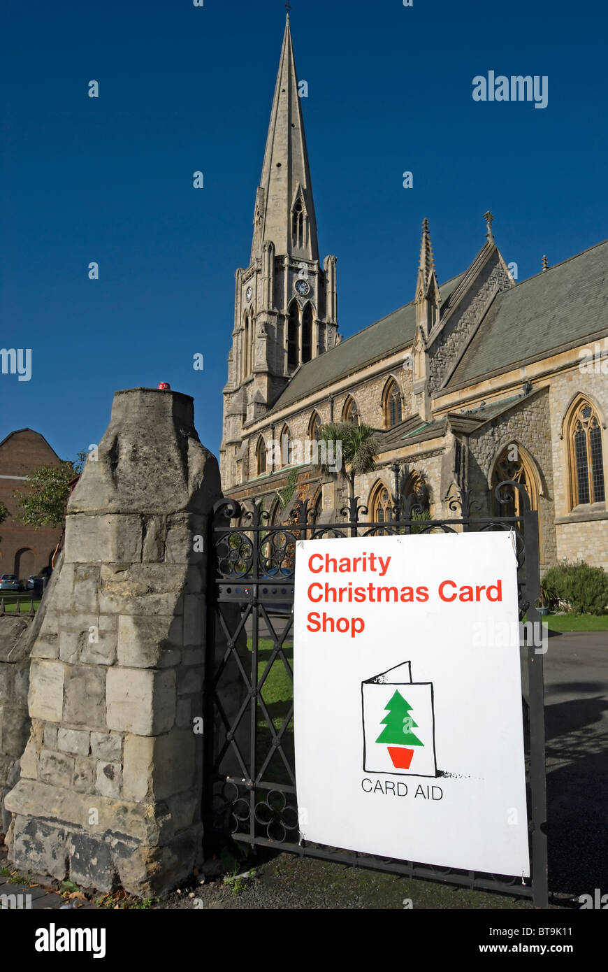 charity christmas card sign outside the church of christ the saviour, ealing, west london, england Stock Photo