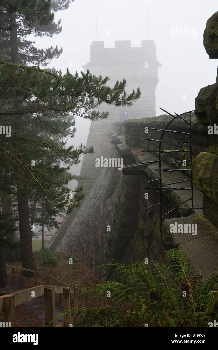 Misty view of the dam wall on Ladybower reservoir Stock Photo