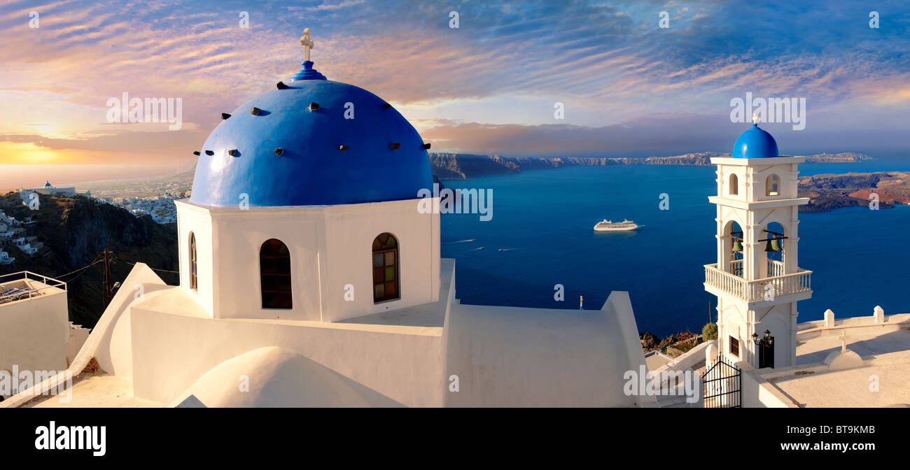 Traditional blue Domed church of Imerovigli looking across the sea, Santorini, Greece. Stock Photo