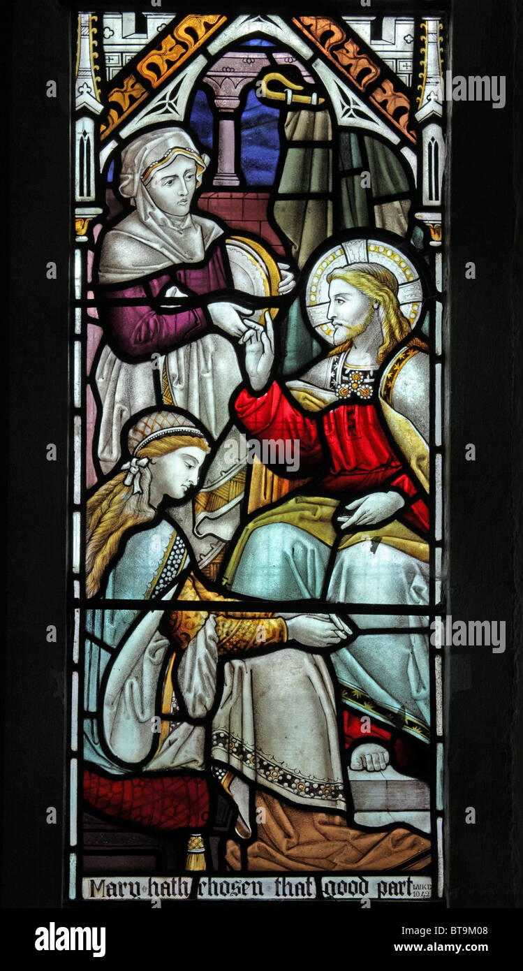 A Stained Glass Window depicting Jesus in the house of Martha and Mary, Challacombe Church, Devon Stock Photo