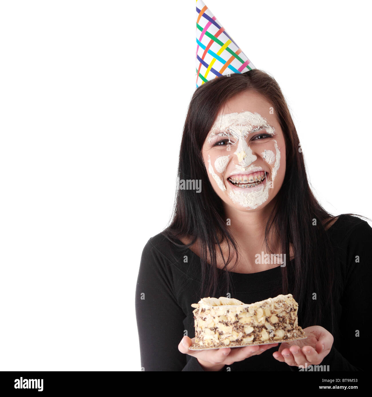 Funny portrait of beautiful young caucasian woman with birthday cake on ...