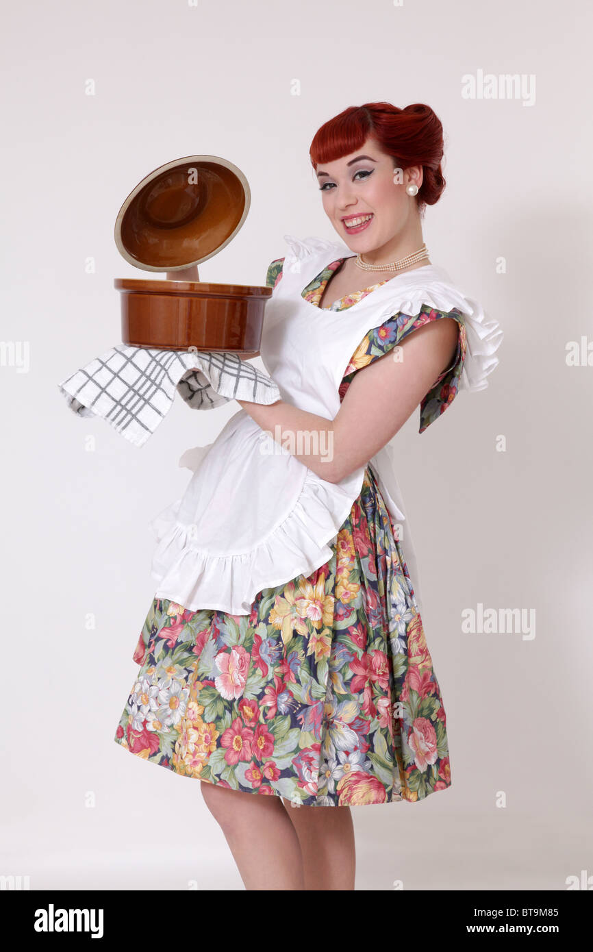 Retro housewife cooking Stock Photo