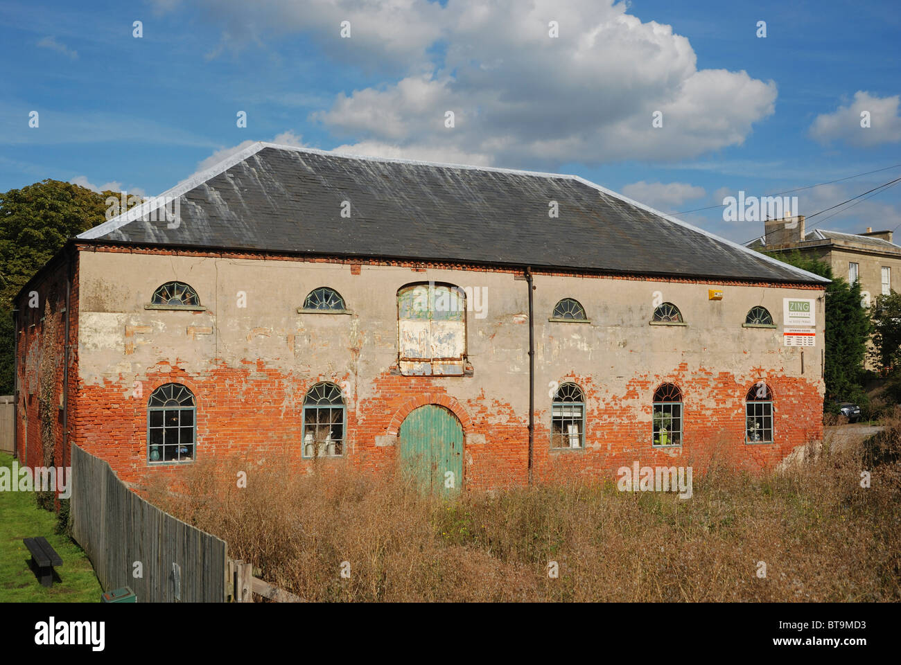 A former warehouse at the side of the Trent and Mersey Canal, Shardlow, Derbyshire, England. Stock Photo