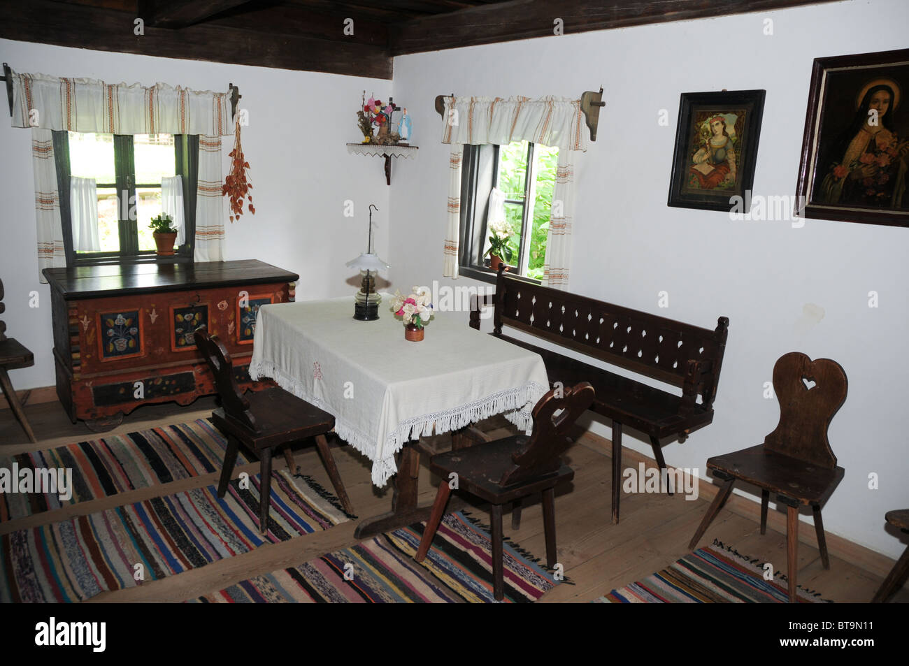 Interior of old wooden hut, traditional decoration and furnitures from