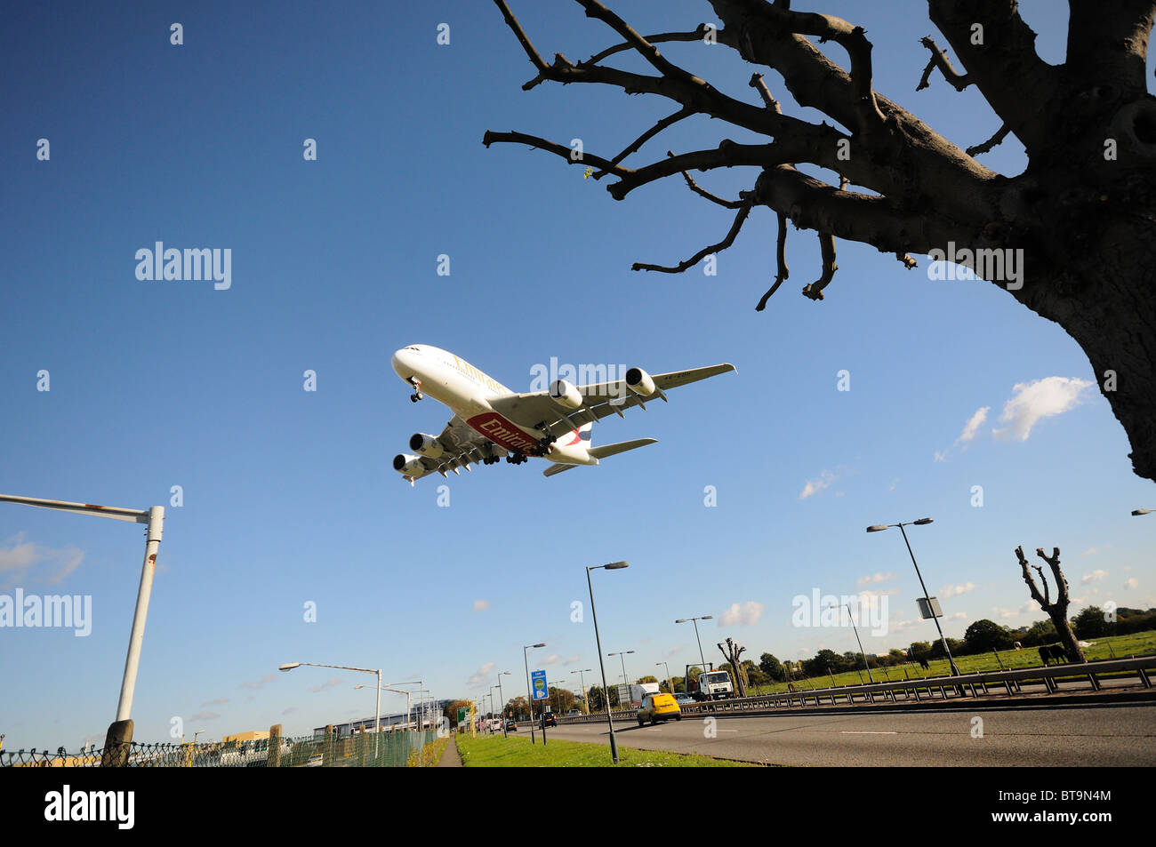 Low flying  passenger jets landing at Heathrow airport Stock Photo