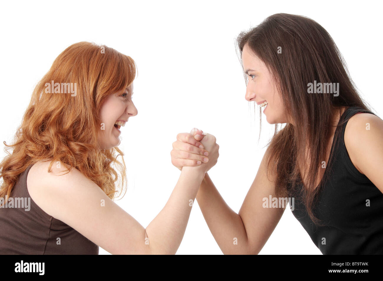 Two womans hands fight, isolated on white background Stock Photo Alamy
