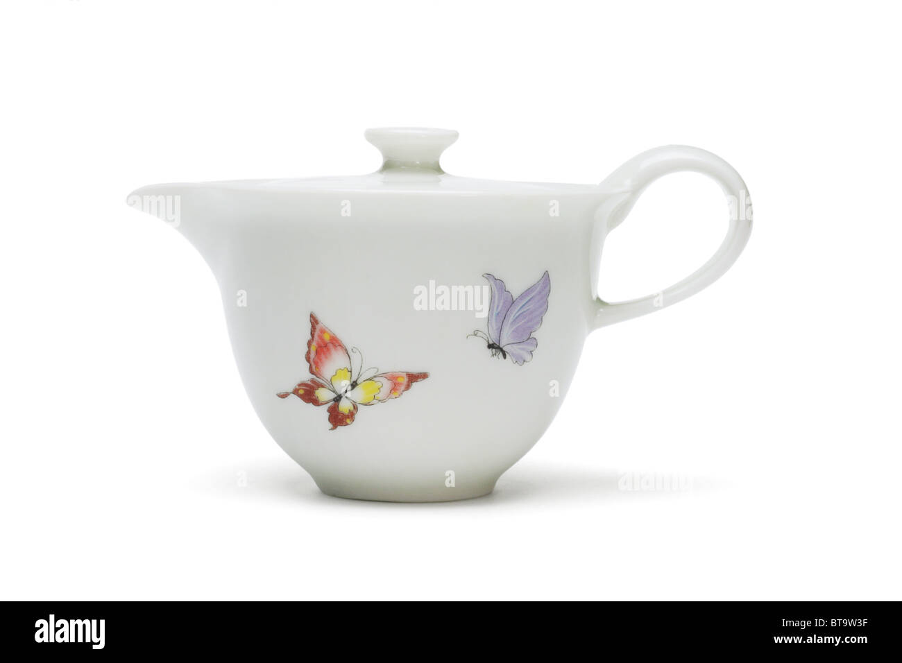 Chinese porcelain tea pot on white background Stock Photo - Alamy