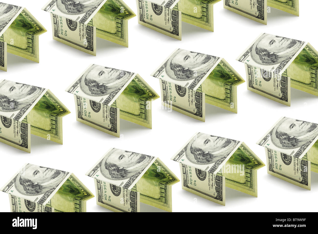 Background of US 100 dollars money houses Stock Photo