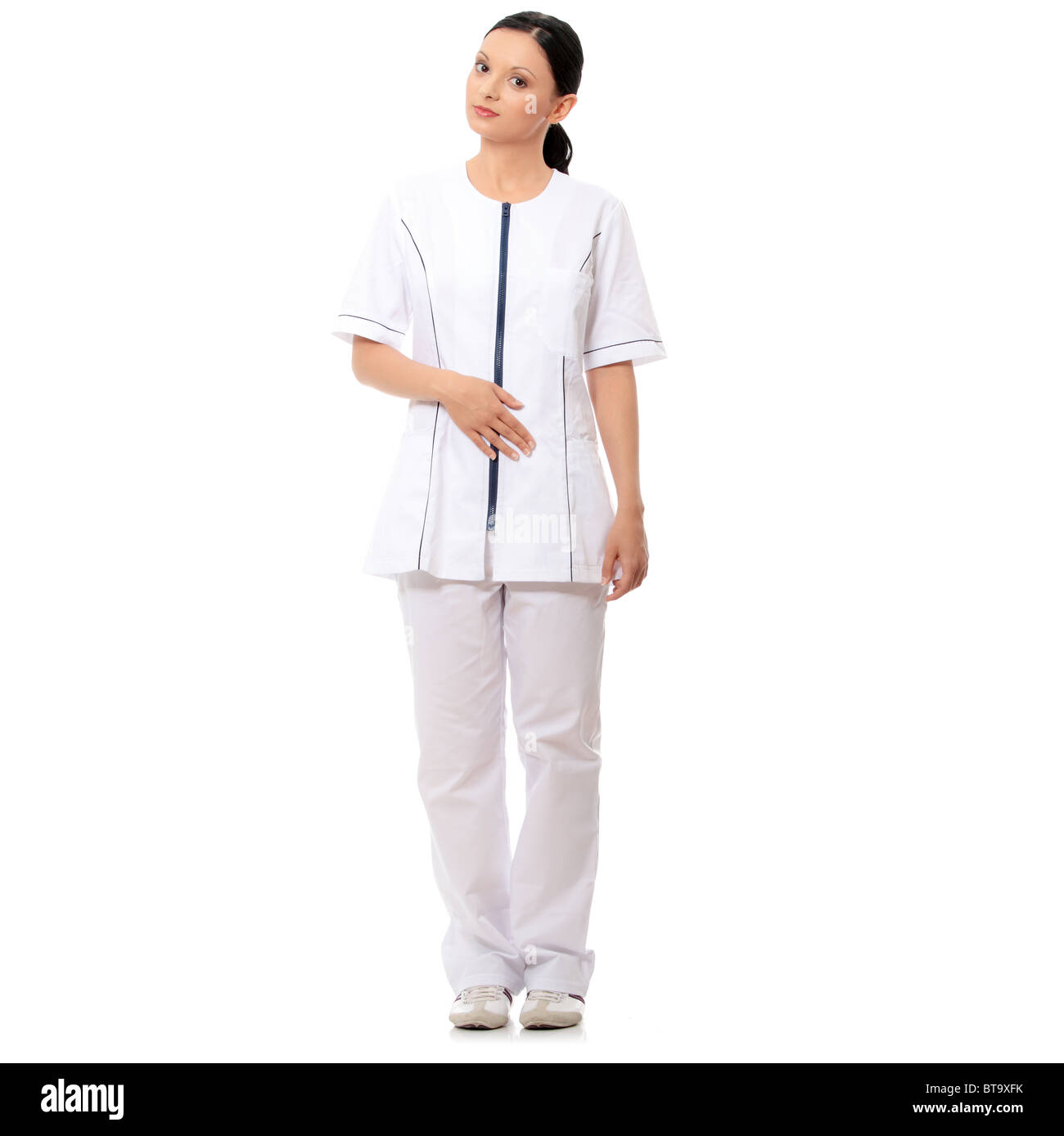 Smiling medical doctor or nurse. Isolated over white background Stock