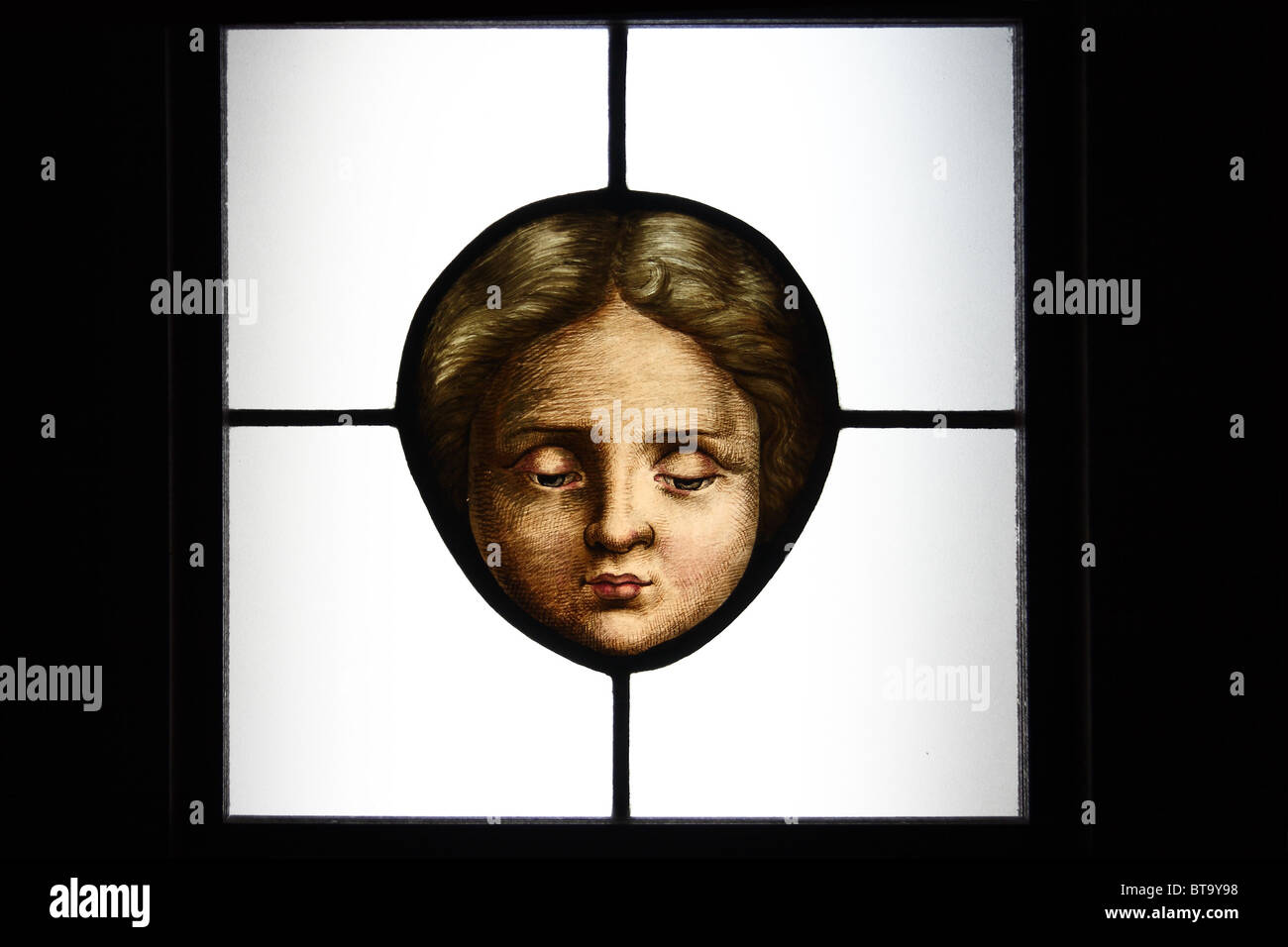Stained glass panel (detail). Head of a child (around mid 19th century). Museum of Architecture, Wroclaw. Stock Photo