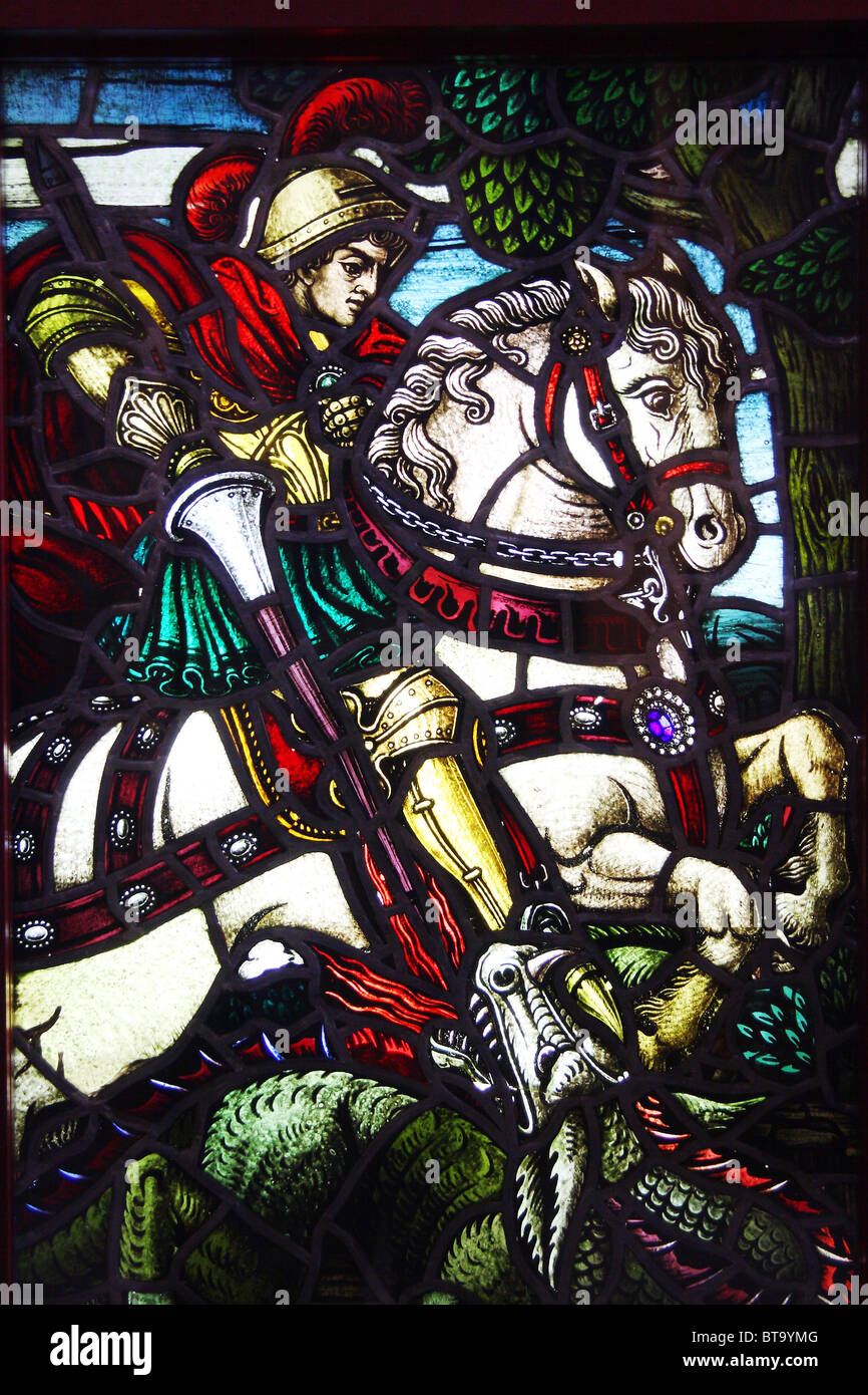 Stained glass panel with a scene - St. George fighting with a dragon. (20th century). Museum of Architecture, Wroclaw. Stock Photo