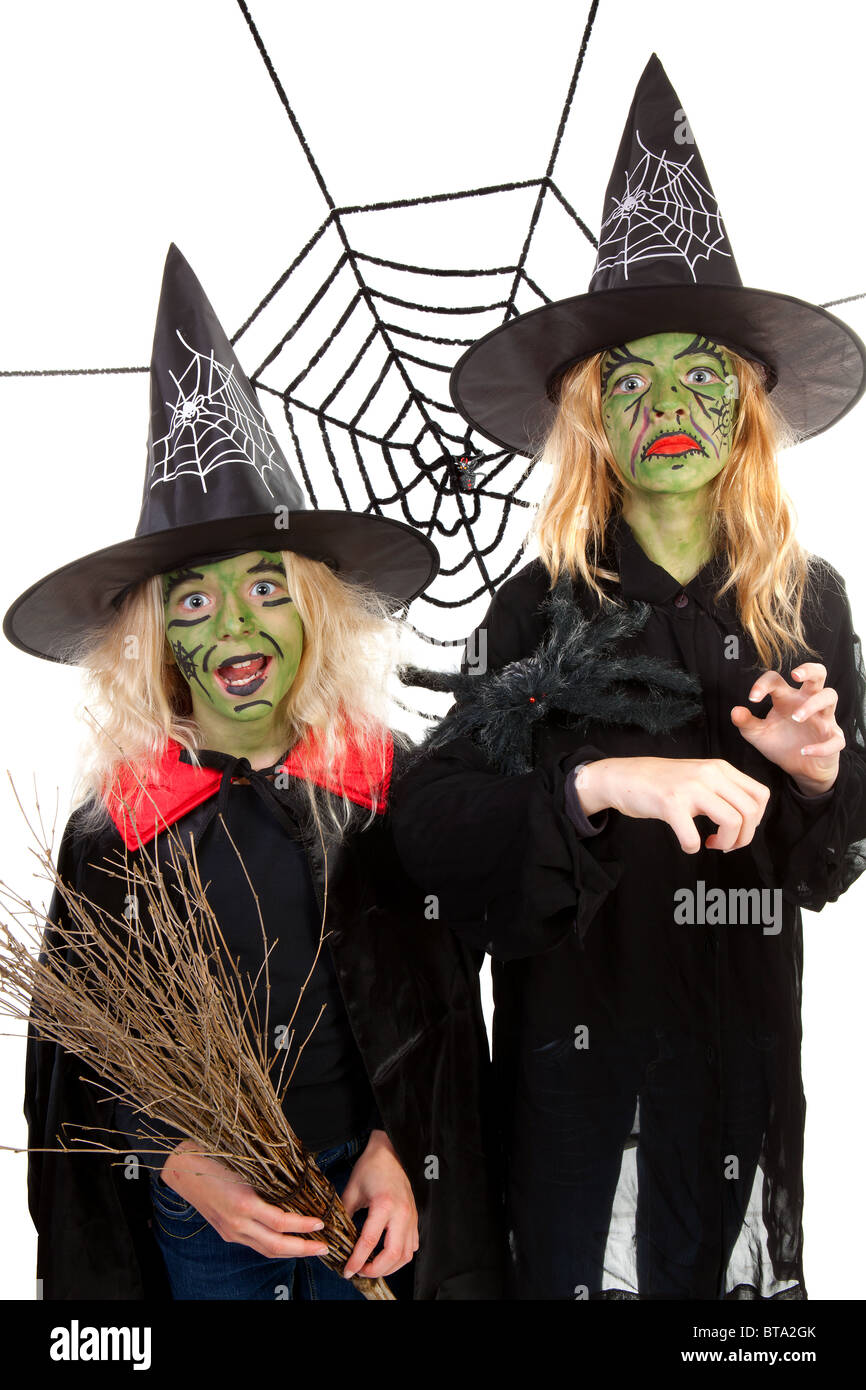 Scary Green Witches For Halloween With Spiderweb Over White Stock Photo Alamy