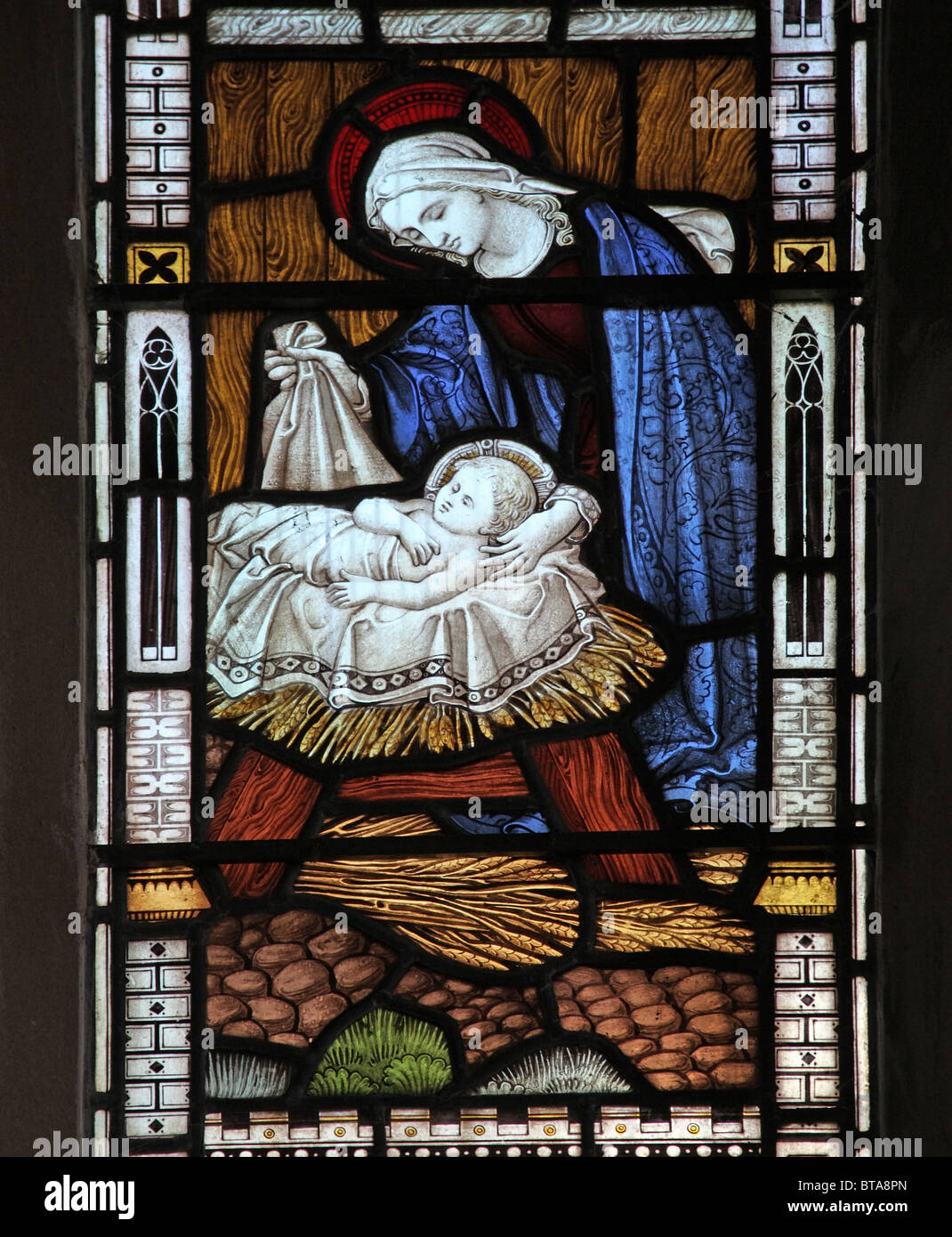A Stained Glass Window depicting The Nativity, Parish Church of St Peter, West Buckland, Devon Stock Photo