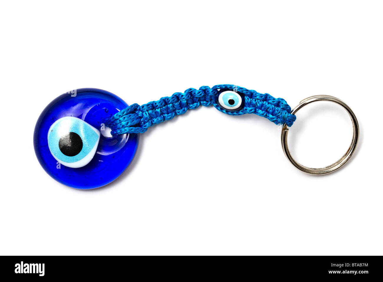 Blue ' cat eye' keychain isolated on white background Stock Photo