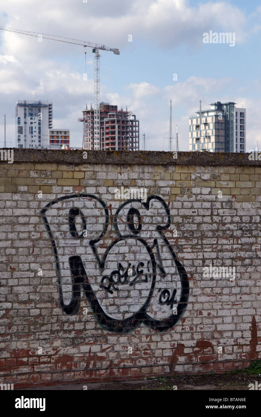 Graffiti beside a building site, Ipswich, Suffolk, UK. Stock Photo