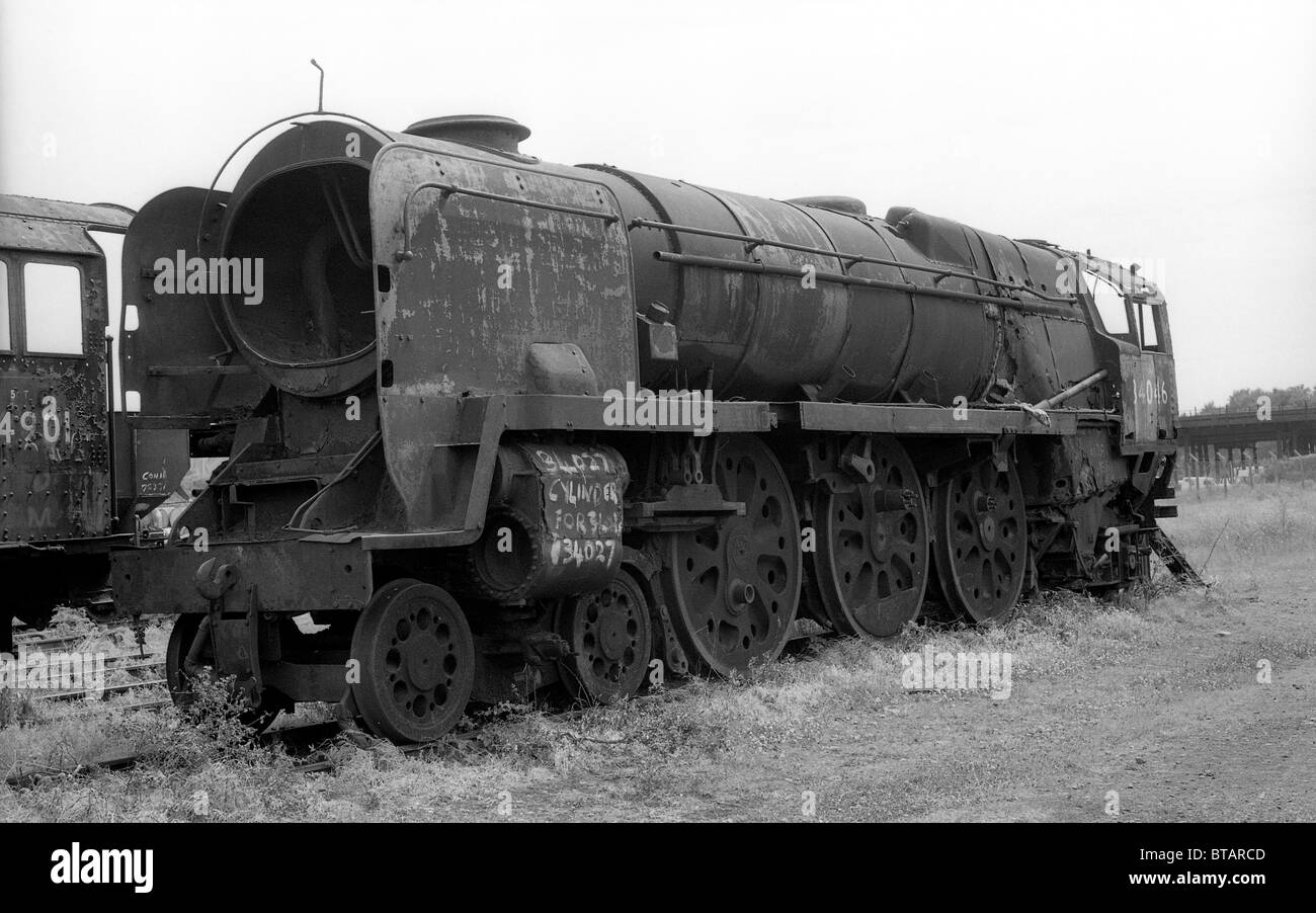 Scrapyard of British steam locomotives at Woodhams Yard in Barry South Wales July 1981 Britain 1980s PICTURE BY DAVID BAGNALL 34046 Braunton Stock Photo