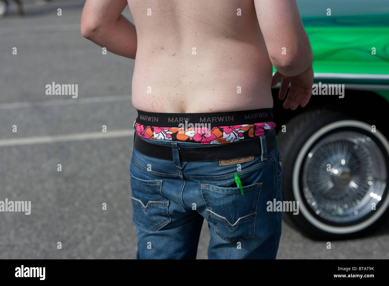 Man with low pants with visible underwear Stock Photo - Alamy